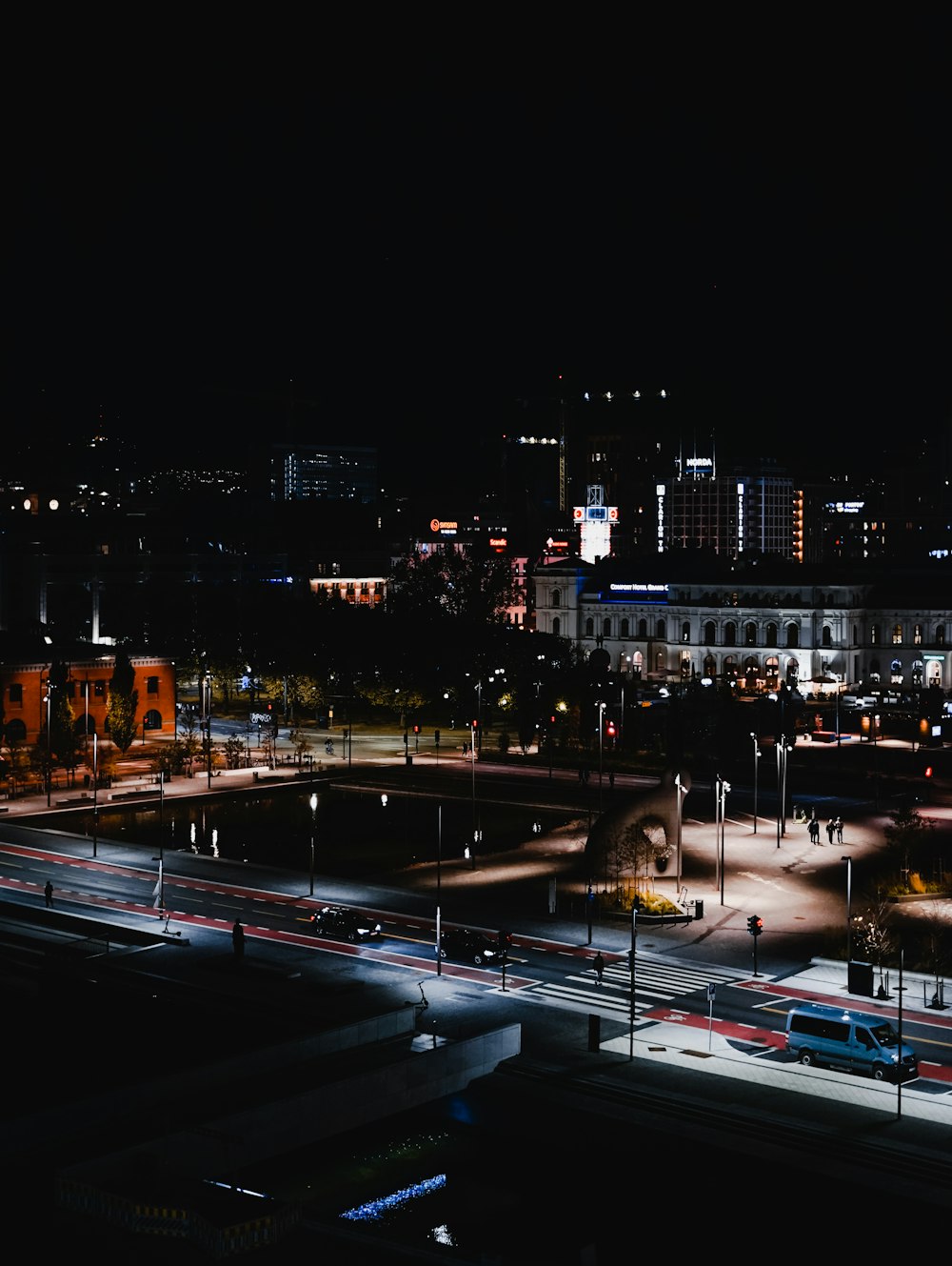 a nighttime view of a city with a lot of traffic