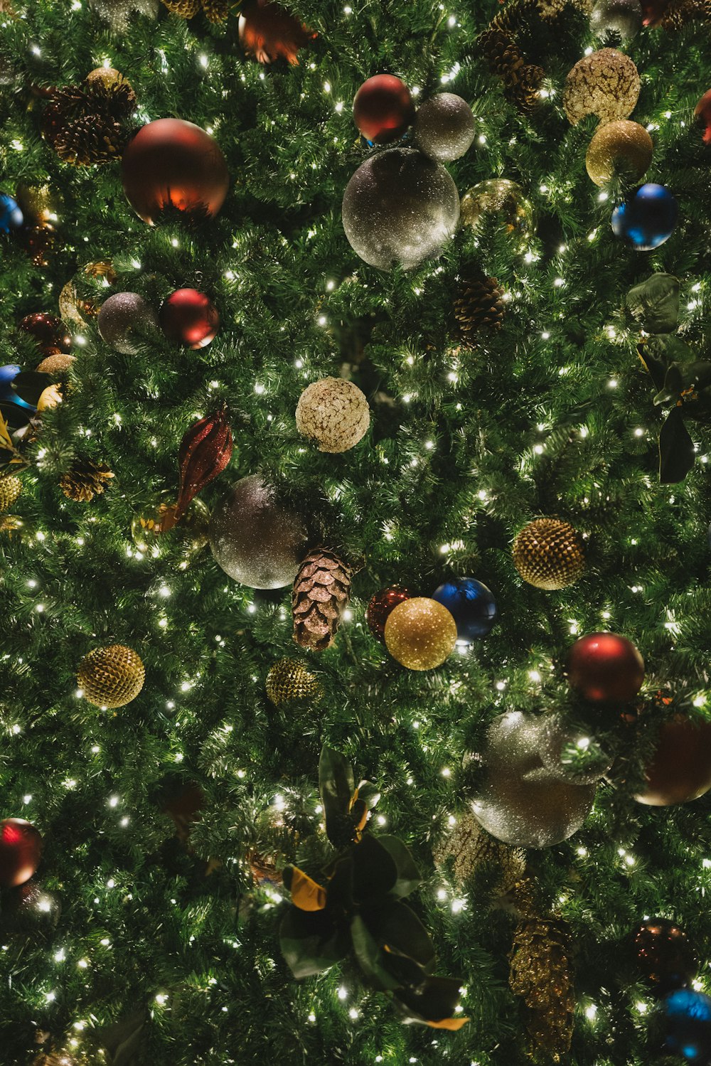 a christmas tree with a lot of ornaments on it