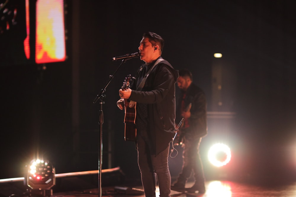 a man standing on a stage