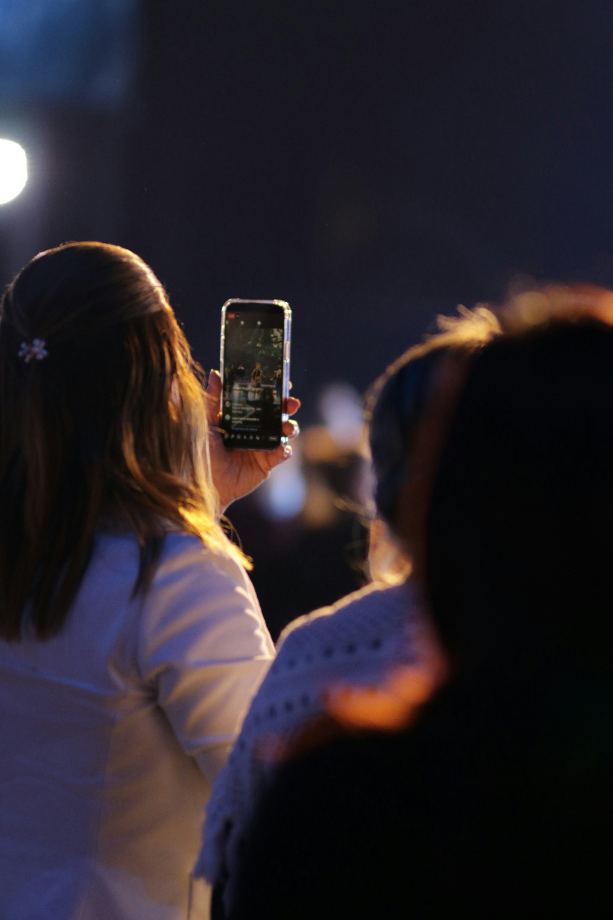 a woman holding a wine glass