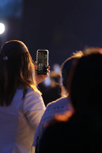 a woman holding a wine glass