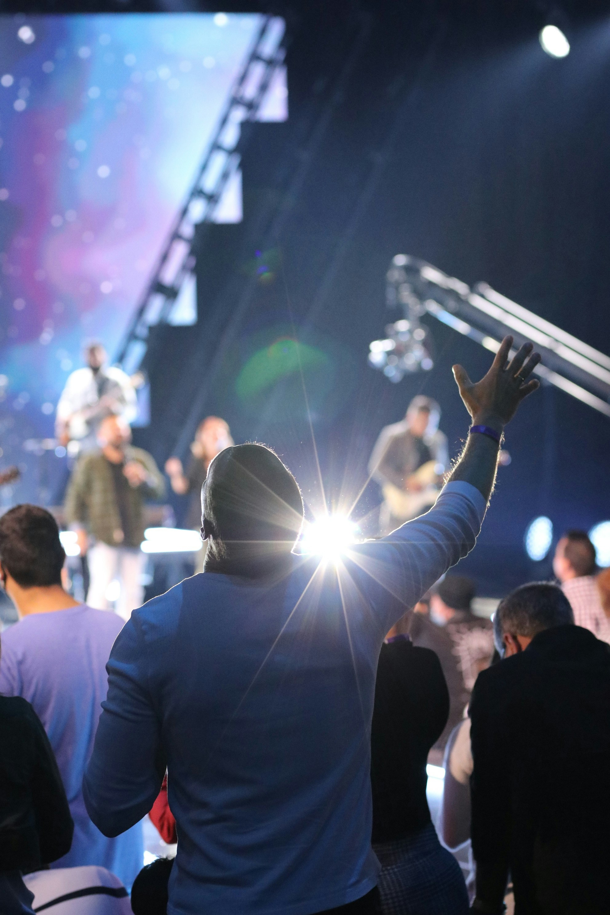 a man standing in front of a crowd of people