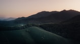 A serene Sri Lankan landscape with lush greenery and sunlight.