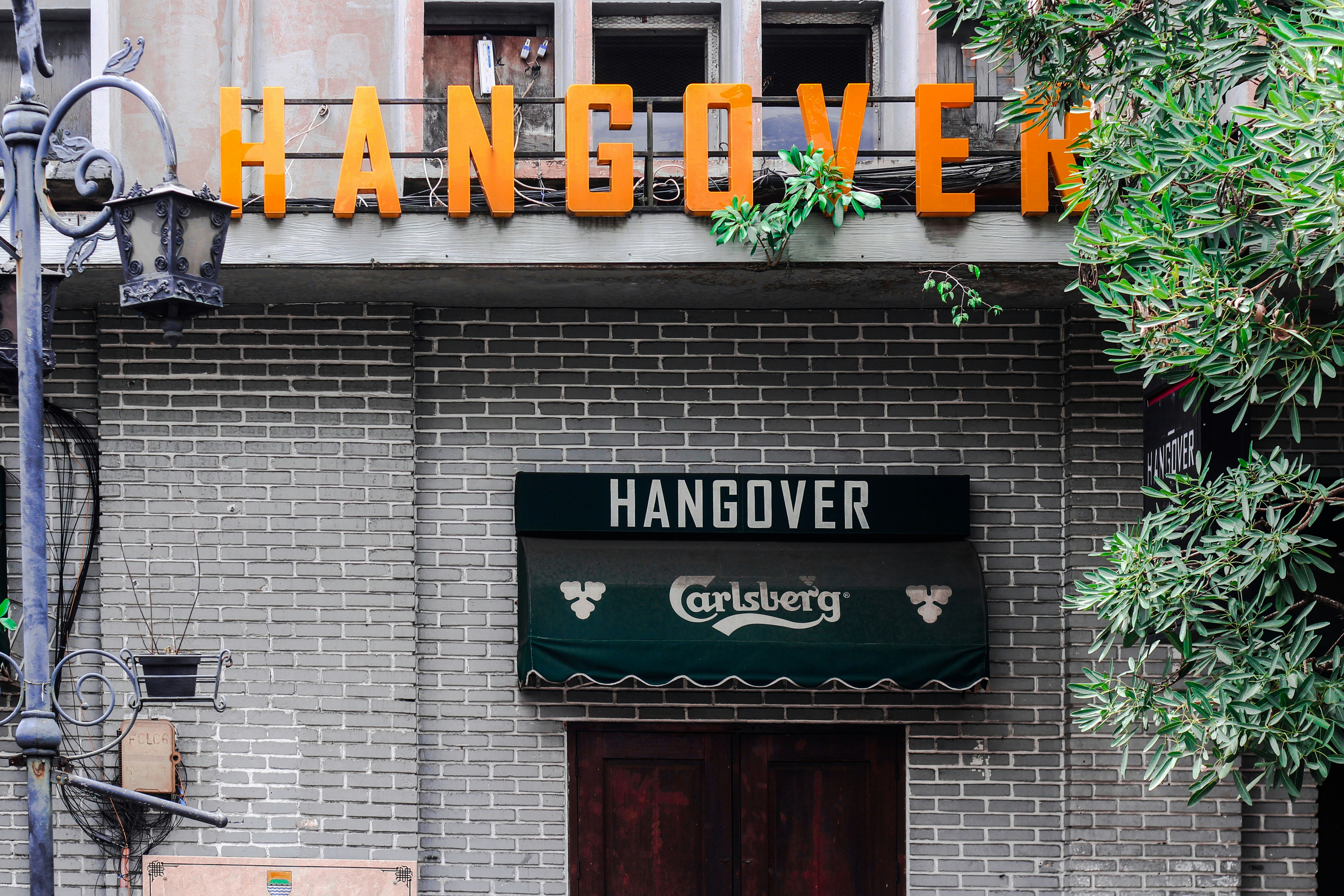 Young adult feeling hungover in Oklahoma City after a night out – hangover iv okc