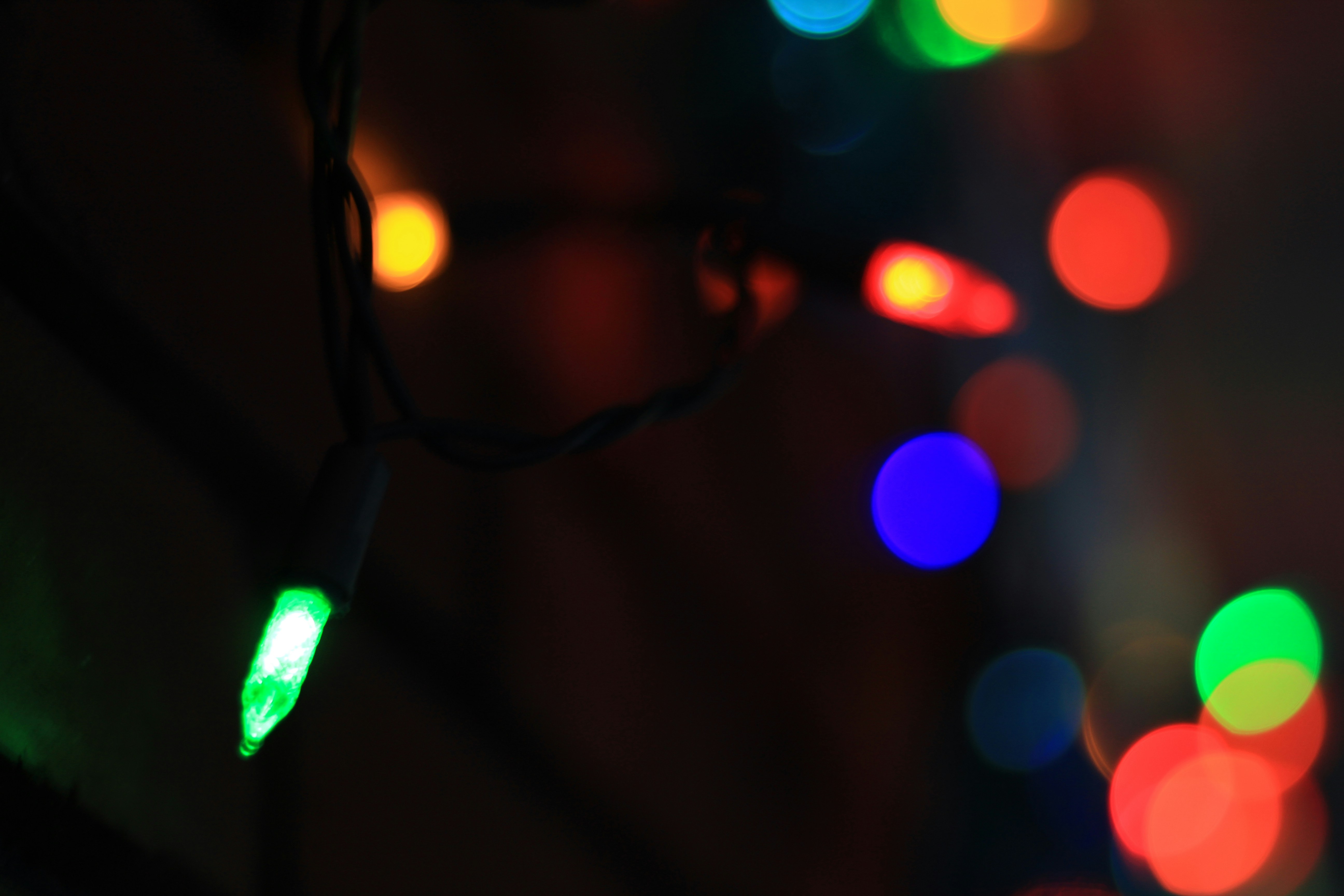 a close up of a string of christmas lights, Christmas lights