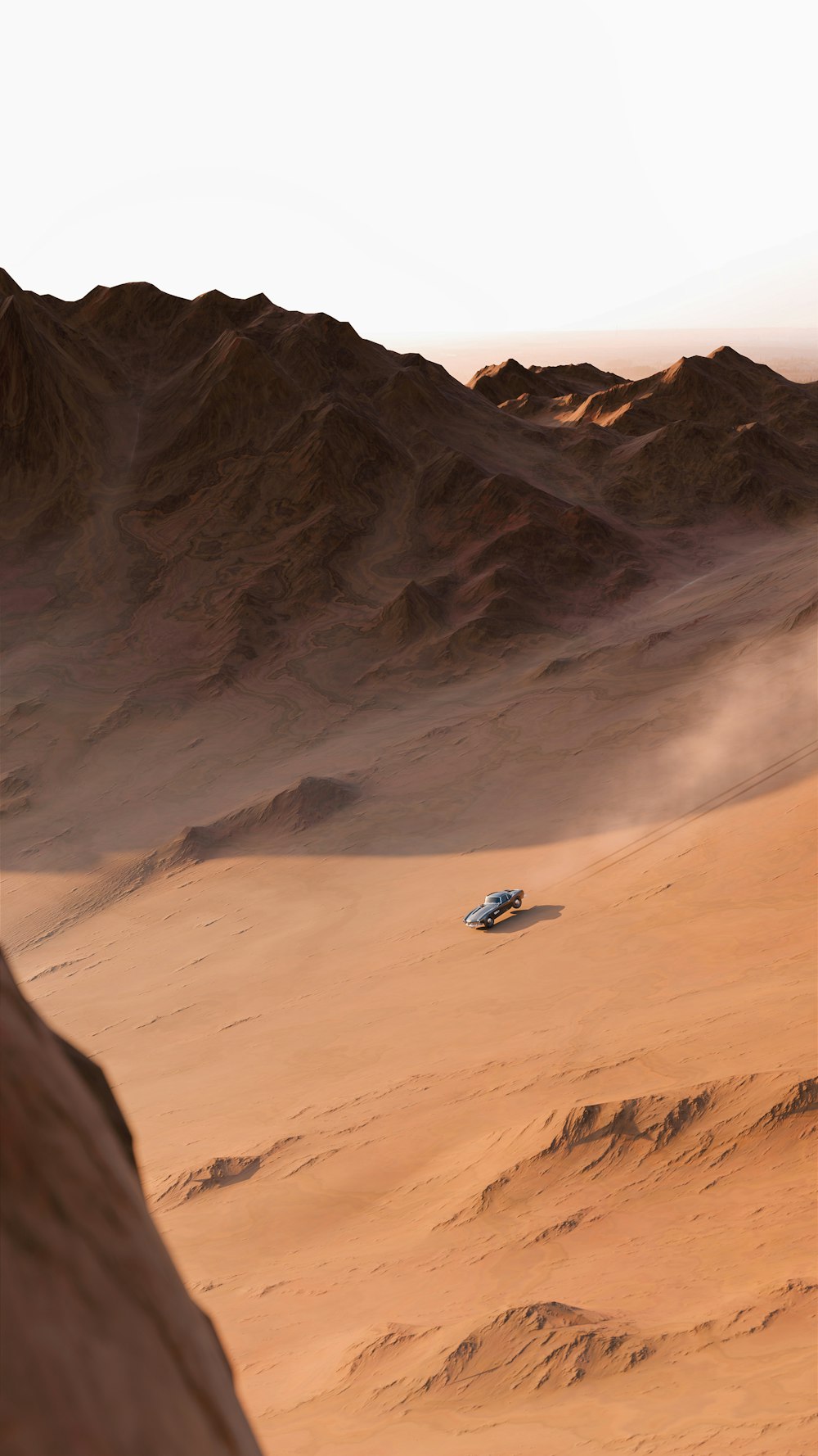 um carro está dirigindo através do deserto
