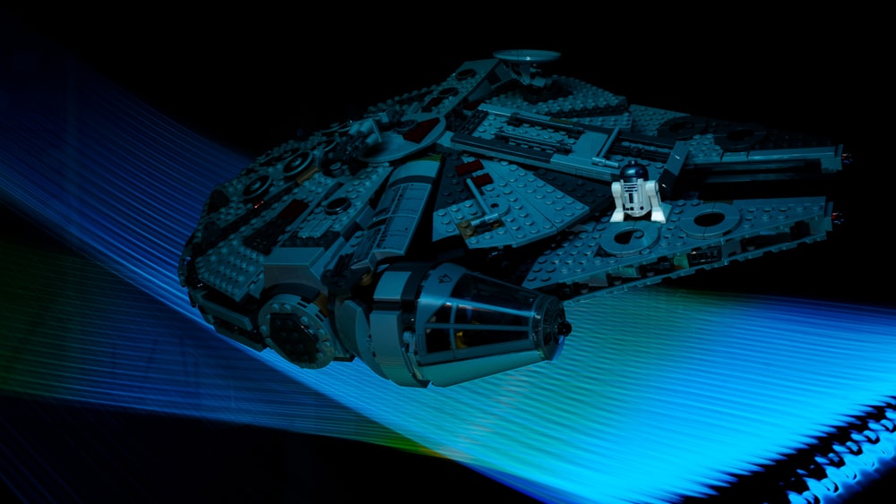 a lego star wars vehicle is shown in the dark