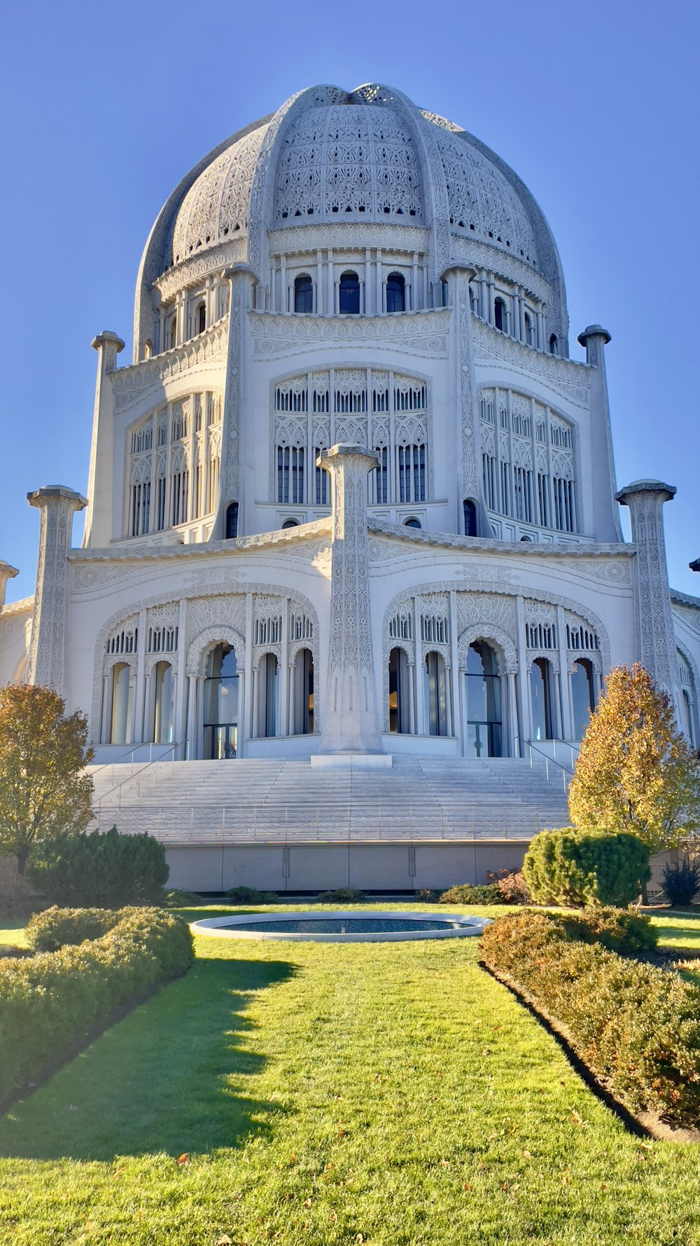 a large white building with a dome on top of it