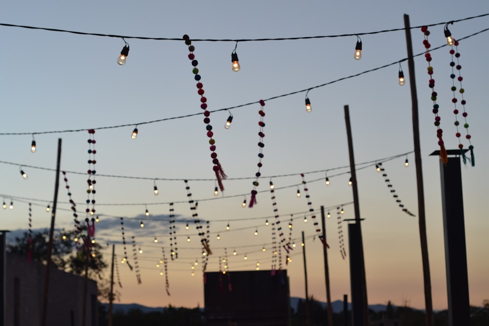 a string of lights hanging over a street