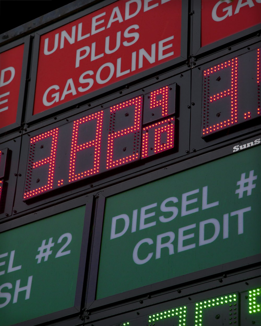 a gas station sign showing diesel and cash