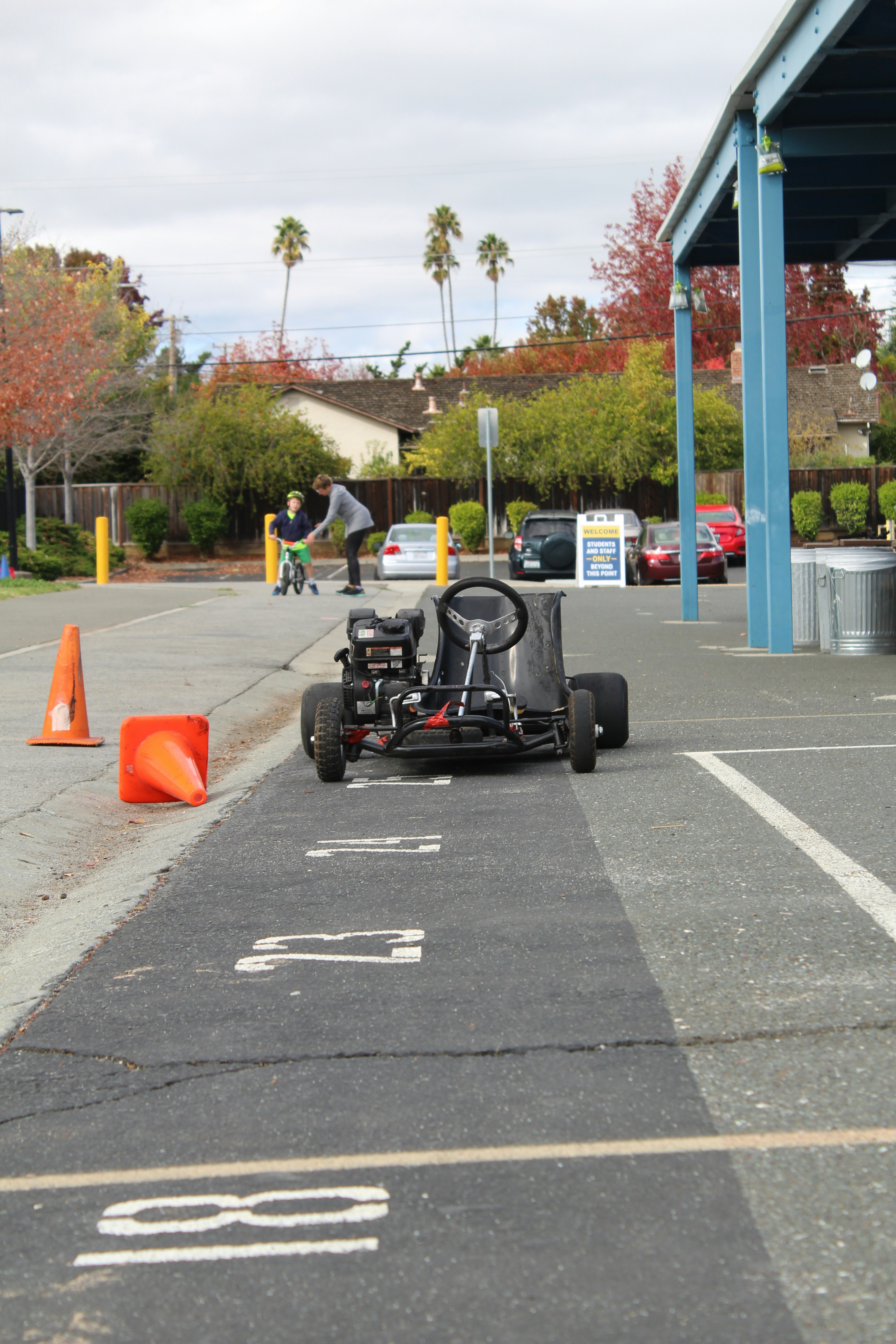 a go kart is parked on the side of the road