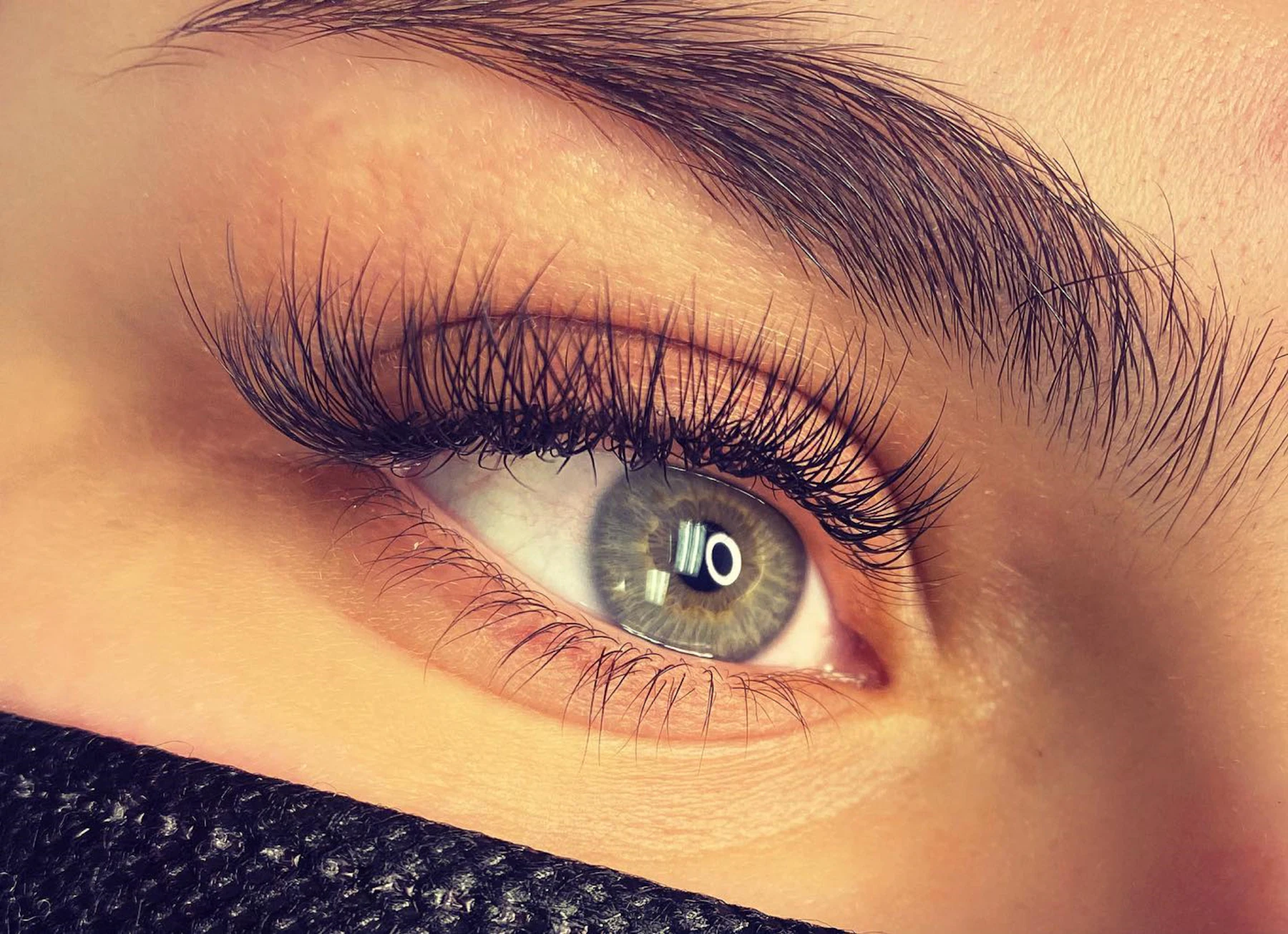 Close-up of finished lash extensions