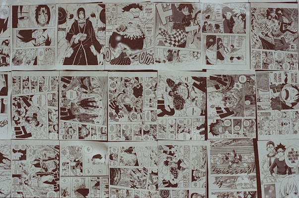 A collage of monochromatic manga panels featuring various characters and scenes. The panels depict action sequences, emotional moments, and dialogues between characters. The scenes vary in complexity from intense battles to calm, conversational settings. Speech bubbles are present throughout the panels, contributing to the narrative.