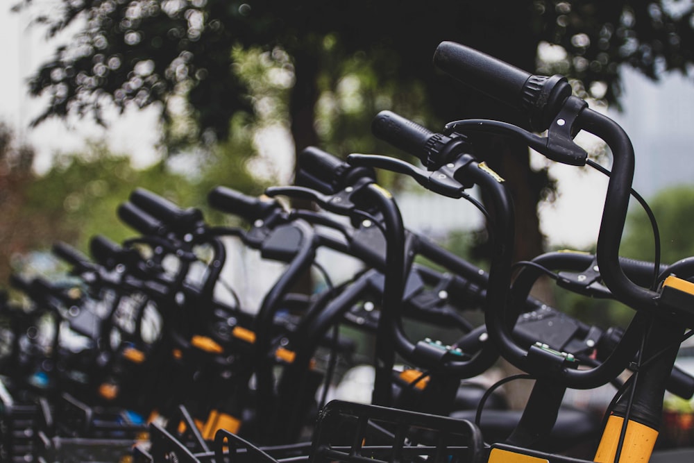 a row of bikes parked next to each other