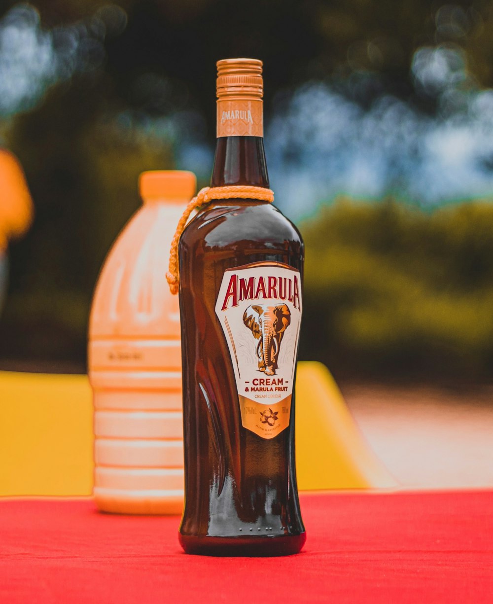 a bottle of amar amar sitting on top of a table