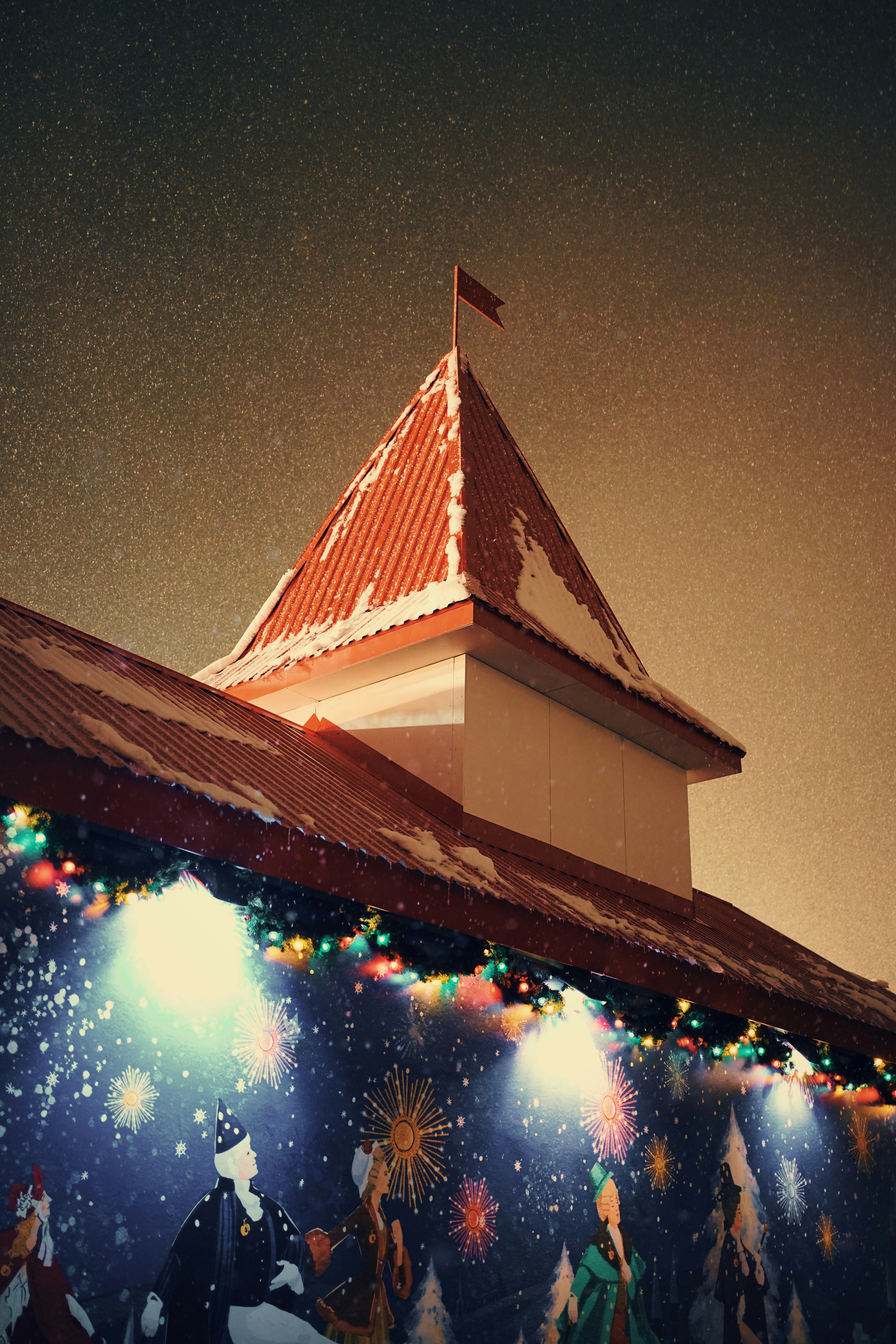 a picture of a building with lights on it