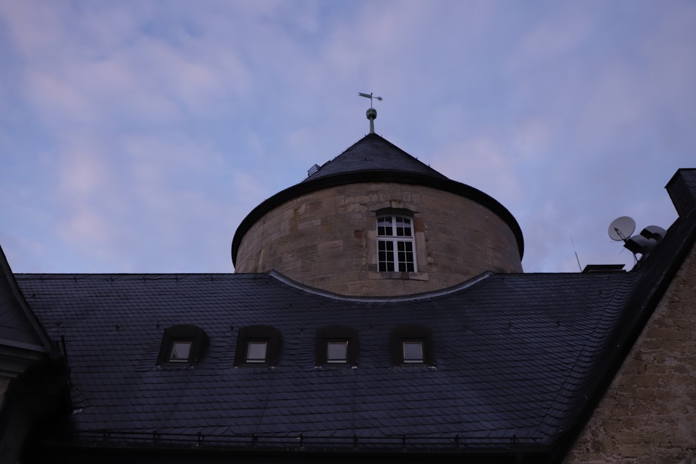 a building with a cross on top of it