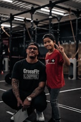 a man and a little girl posing for a picture