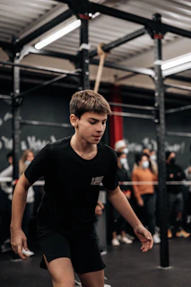 a young man is practicing his moves on a skateboard