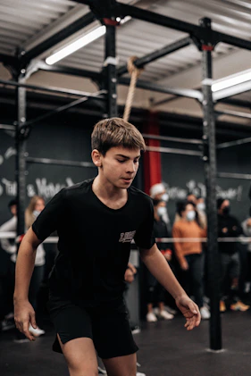a young man is practicing his moves on a skateboard