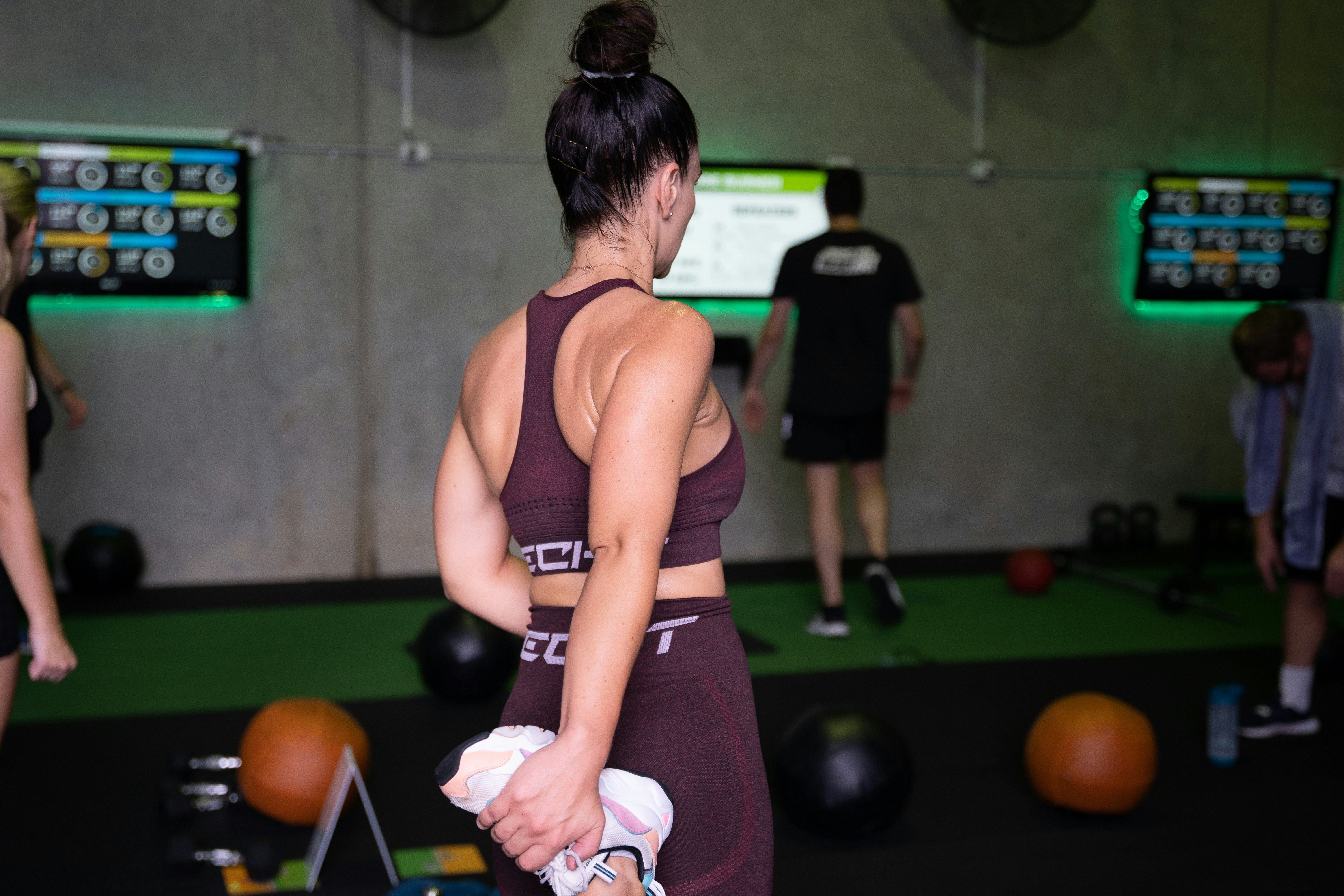 Coach demonstrating proper form