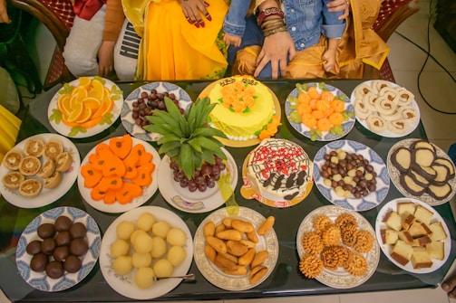 A festive party table with colorful desserts and drinks, capturing the joyful atmosphere.