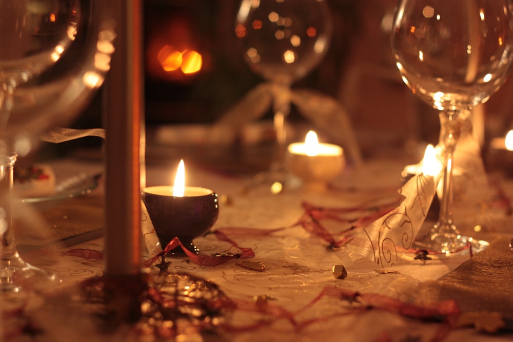 a close up of a candle on a table