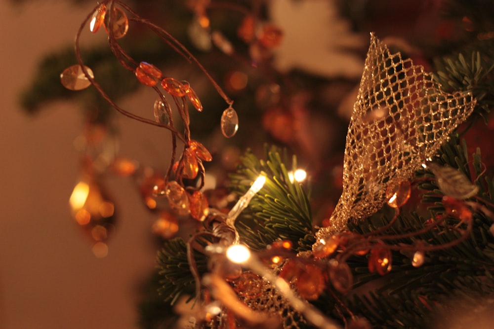 a close up of a christmas tree with lights