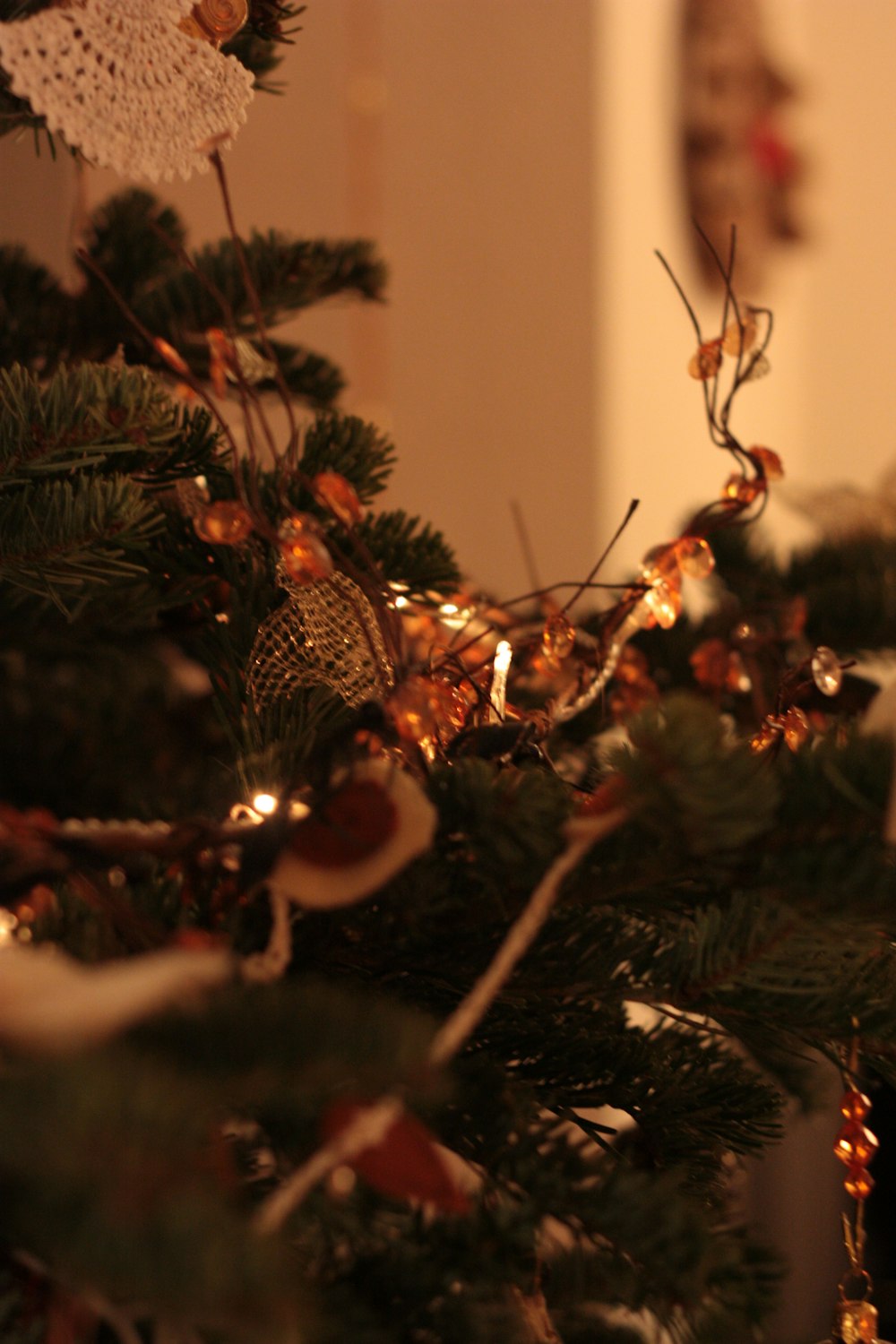 a close up of a christmas tree with lights