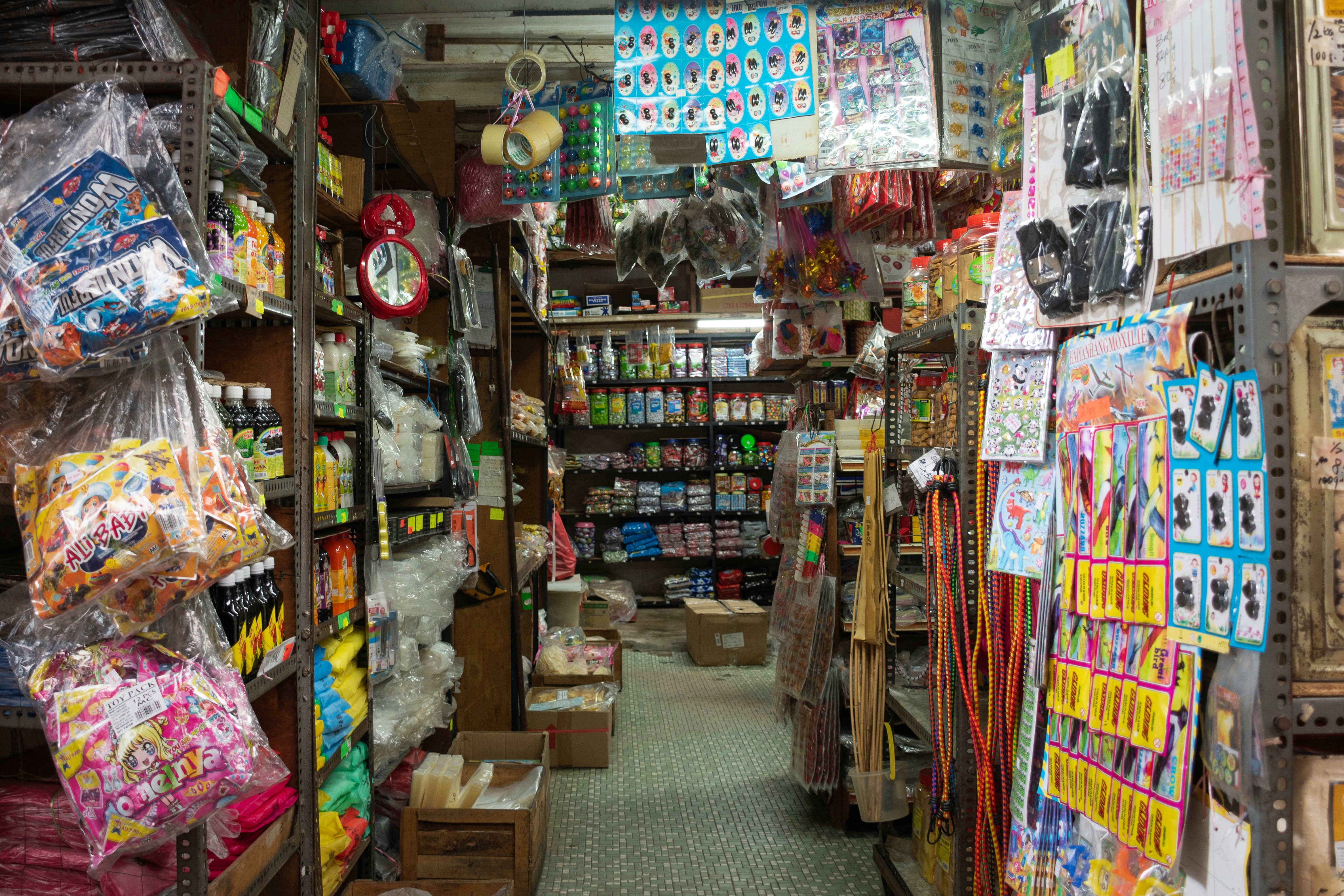 a store filled with lots of different items, The interior of an old Chinese grocery store.
