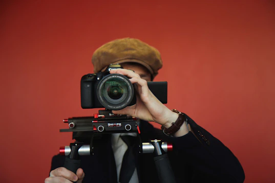 a man taking a picture with a camera