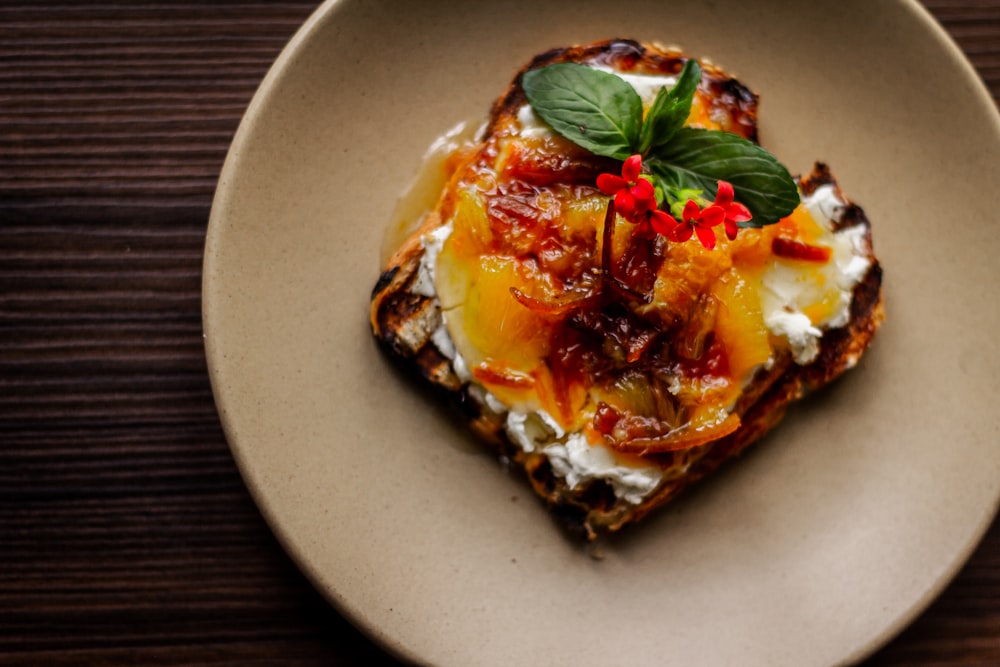 a plate of food on a wooden table