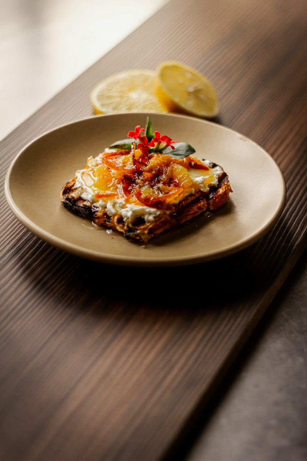 a plate of food on a wooden table