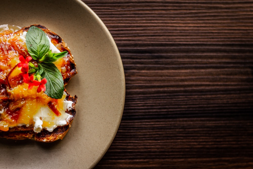 a plate of food on a wooden table