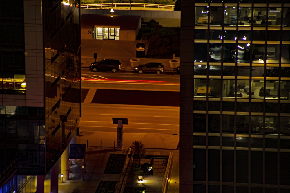 a view of a city street at night from a high rise building