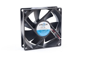 A computer cooling fan that is square in shape with a central rotor and multiple blades. The label on the rotor reads 'Ortek' with model number 'CF-12825LB' and specifications such as 'DC 12V 0.12A'. Connecting wires protrude from the side, indicating it is designed for electronic use.