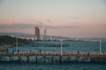 a pier in the middle of a large body of water