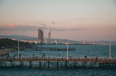a pier in the middle of a large body of water