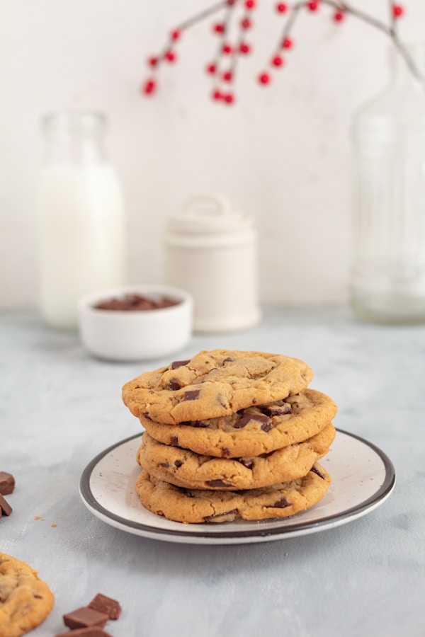 A stack of chocolate chip cookies on a plate