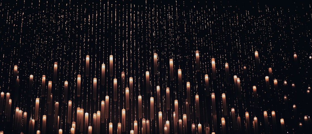 a group of candles that are in the air