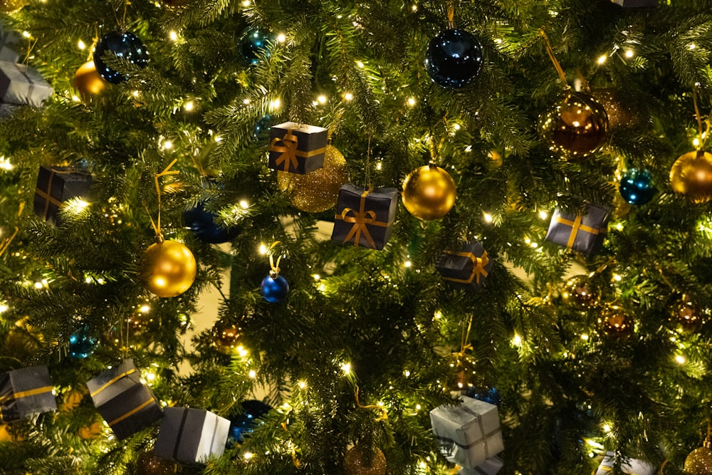 a decorated christmas tree with presents on it