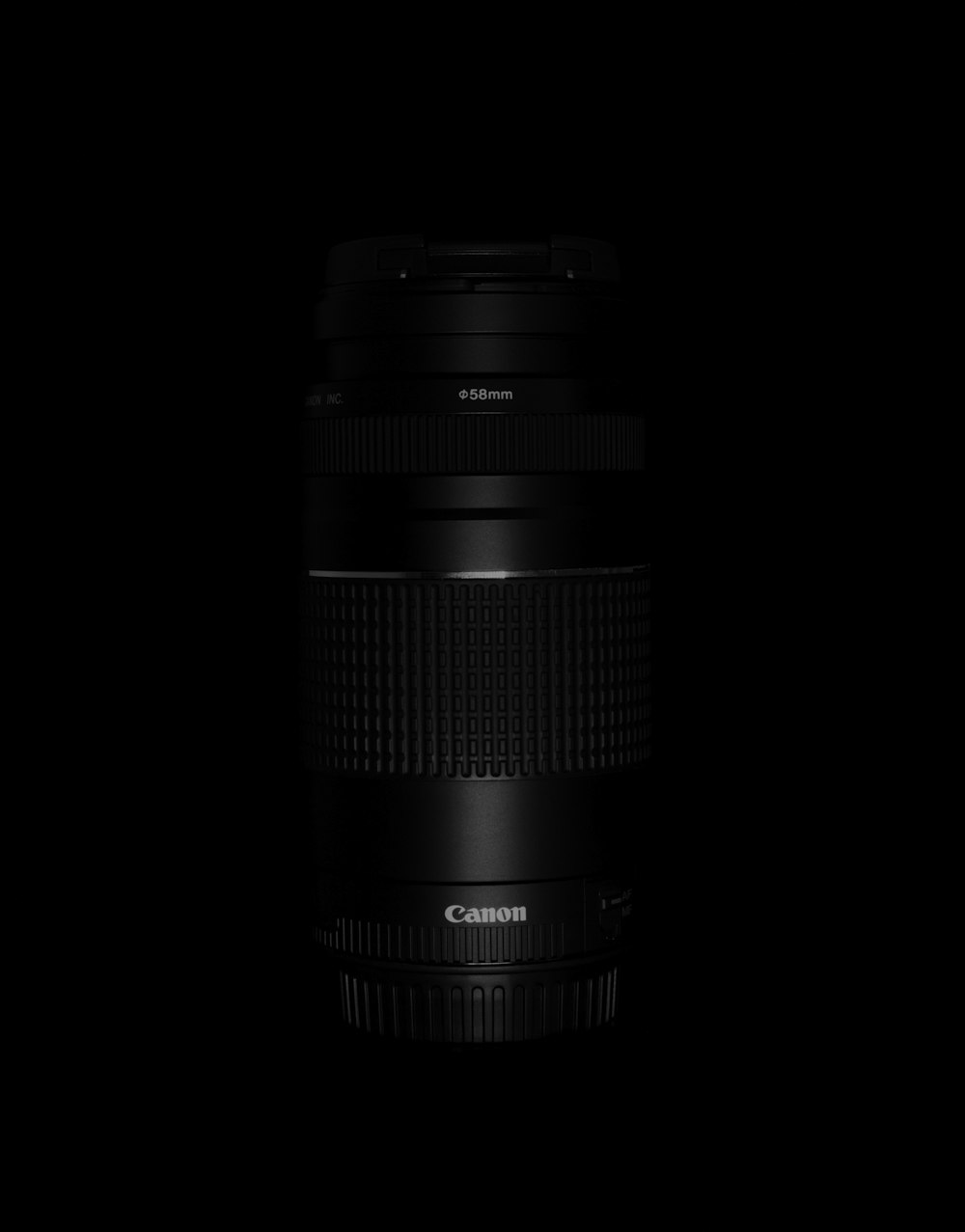 a camera lens on a black background