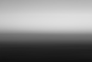 a black and white photo of the ocean