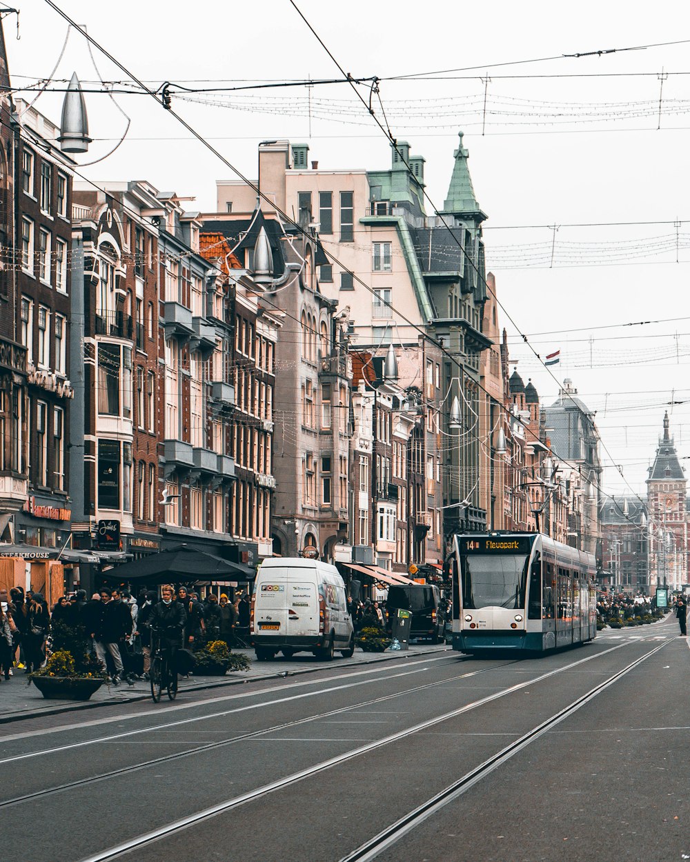 a city street filled with lots of tall buildings