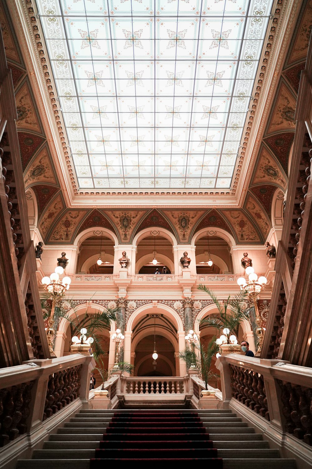 a staircase leading up to a skylight in a building