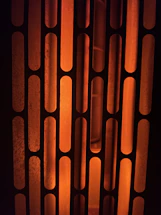 A sleek, cyber-industrial style form interface glowing with orange borders on a black background.