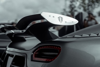 a close up of the tail light of a sports car