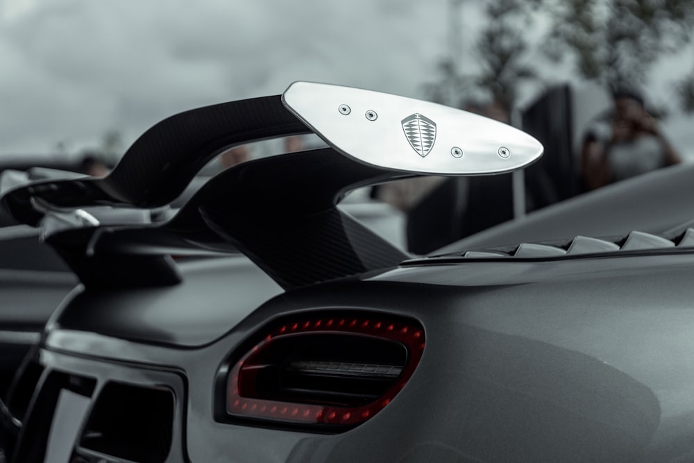 a close up of the tail light of a sports car