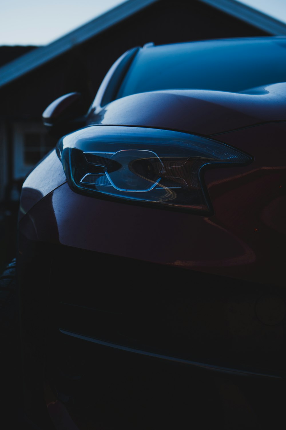 a car parked in front of a house