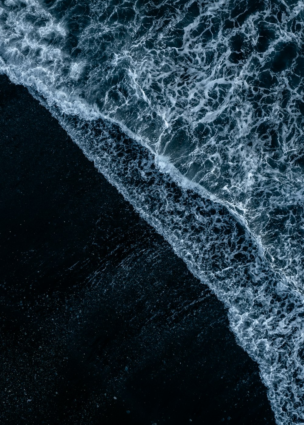 a black and white photo of the ocean